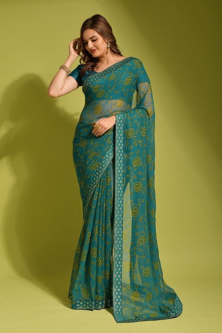 Floral Print and Foil work Green Color Georgette Saree For Women, Bollywood Saree for Reception, Bridesmaid Saree for Wedding, Sangeet Saree Saree Details:  Saree Color: 1) Green 2) Pink  Saree Length: 5.5 Meter Saree Fabric: Georgette chiffon Saree Work :  Flower print and foil work  Blouse Details : Blouse Color: Matching. Blouse Length: 0.8meter Blouse Fabric: heavy Mono benglory satin Blouse Work: Plain  Blouse wear by model is just for modeling purpose only actual blouse may vary. Washing Care : Dry Clean only Made for : Women.  For More Collection Visit : https://etsy.me/41oJEEs Occasion : Farewell, Traditional, Wedding, Reception, Sangeet, Engagement, Festive, Casual wear, Party wear, Functions,Formal events, Bollywood wear, Office wear, Daily wear, Gift etc. WE ALSO TAKE BULK ORDER Georgette Bandhani Print Dupatta For Reception, Reception Georgette Dupatta With Bandhani Print, Reception Dupatta In Georgette With Bandhani Print, Saree With Bandhani Print For Reception, Traditional Bandhani Print Saree For Reception, Green Georgette Traditional Wear For Reception, Green Georgette Blouse Piece For Reception, Reception Bandhani Print Saree, Green Self Design Blouse For Reception