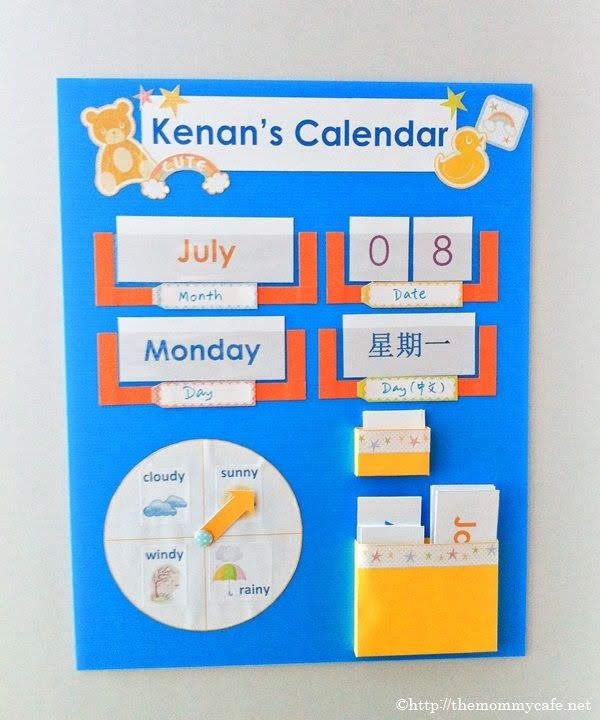 a blue and orange calendar is hanging on the wall