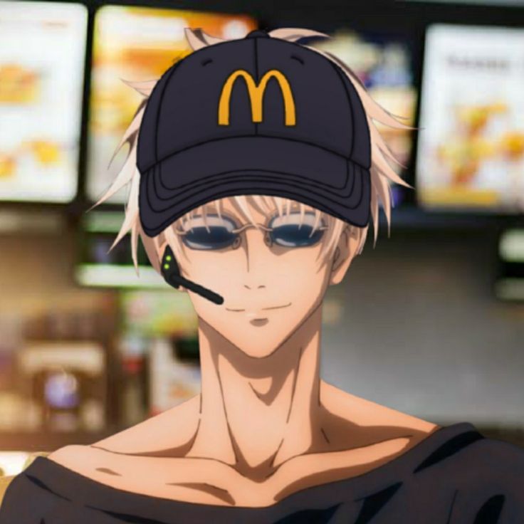 a man wearing a mcdonald's hat and eyeliners in front of a fast food restaurant