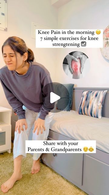 a woman sitting on top of a bed next to a small child's bed