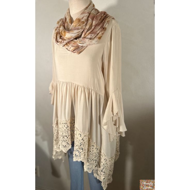 Nwt Asymmetrical Crochet Hem Tunic Top. It’s A Beige/Cream Color And It Comes With The Scarf In The Pics. Didn’t Originally Come With The Top But It Matches Perfect And Looks Great With It. Please See Measurements In Pics. Size Small. Bohemian Tunic For Fall Day Out, Bohemian Tunic For Day Out In Fall, Chic Beach Tunic For Fall, Chic Fall Beach Tunic, Spring Bohemian Tunic With Asymmetrical Hem, Bohemian Tunic With Asymmetrical Hem For Spring, Spring Lagenlook Blouse For Layering, Beige Feminine Blouse For Layering, Chic Beige Tops With Asymmetrical Hem