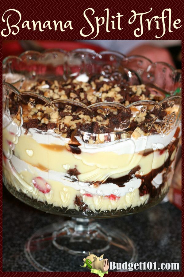 banana split trifle in a glass dish on a table