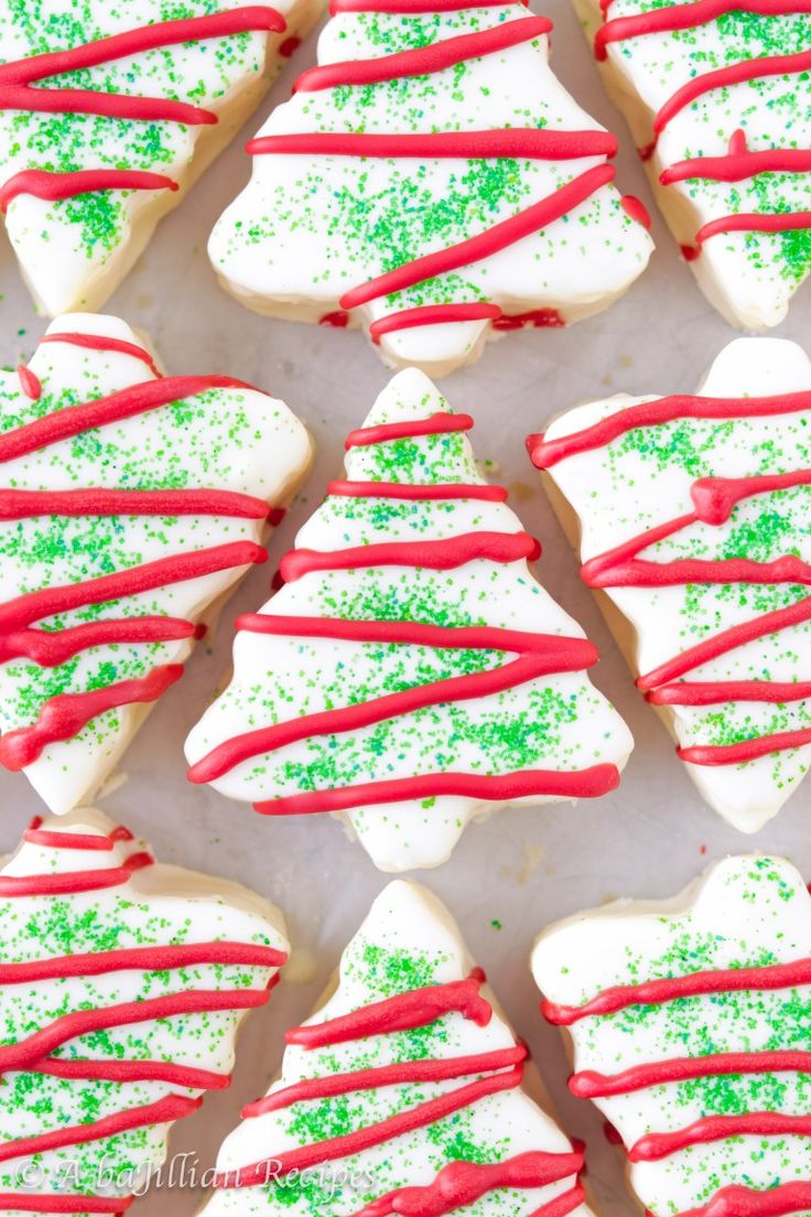 decorated christmas tree cookies with red and green sprinkles