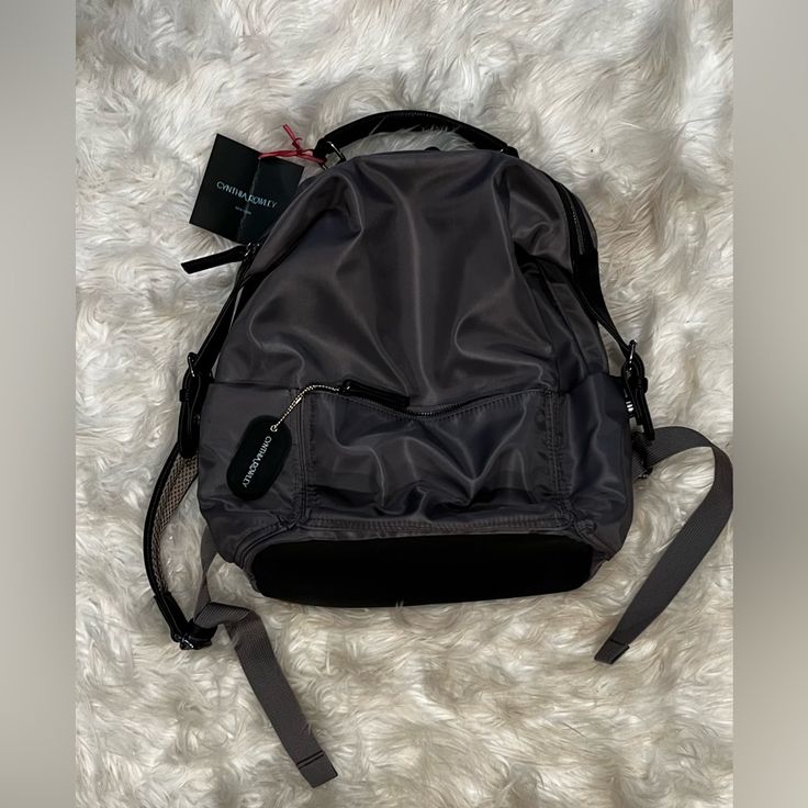 Nwt. Gray Backpack Gray Standard Backpack, Gray Nylon Backpack With Adjustable Strap, Gray Backpack With Adjustable Strap, Gray Backpack, Camo Vest, Skirt Top Set, Grey Backpacks, Hand Gloves, Tropical Leaf Print