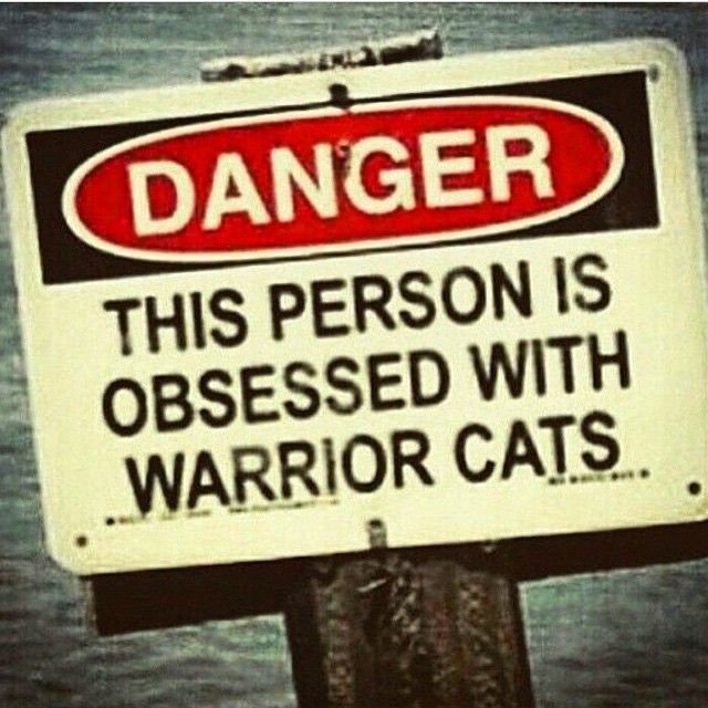 a sign that is on top of a pole in the water saying danger this person is obsesed with warrior cats