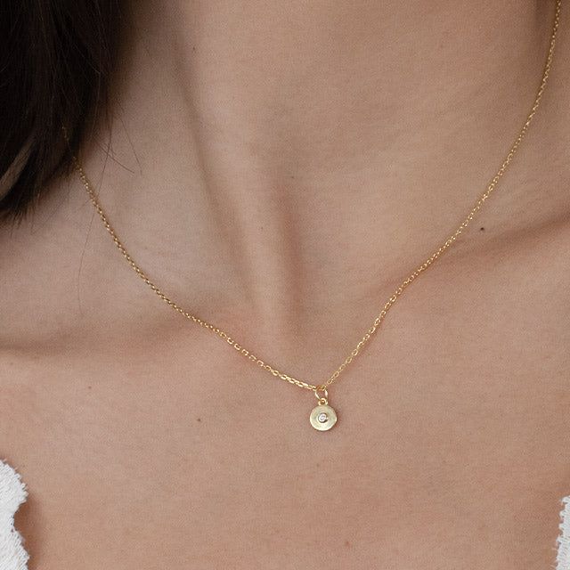 add a classic touch to your everyday style with our 'until I found you necklace'. this dainty, dreamy piece is perfect for everyday layering and the perfect accessory for any occasion - from a casual brunch with friends to a formal meeting. its timeless design ensures it will remain a staple in your wardrobe for years to come. demi-fine 18k gold or rhodium over sterling silver 15" long with a 2" extender chain is 1mm thick pendant is 6mm round Brunch With Friends, Brazilian Gold, Synthetic Diamond, Gold Bond, Found You, I Found You, Cultured Pearls, Everyday Style, Gold Vermeil