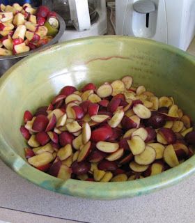 a bowl filled with nuts sitting on top of a counter