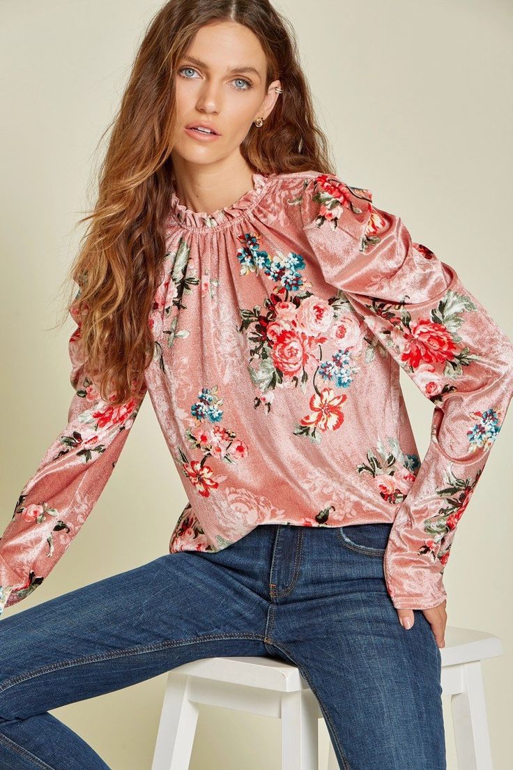 So femme and lovely! This velvet top features puff sleeves, a beautiful floral print and a mock neckline. -Color: Floral/Mauve -A line bodice -Stretchy -Content: 100% Polyester -Imported -Runs true to size -Model is wearing a size Small Feminine Pink Puff Sleeve Top For Fall, Feminine Puff Sleeve Top For Fall, Feminine Floral Print Puff Sleeve Top, Feminine Floral Print Long Sleeve Puff Top, Feminine Long Sleeve Puff Top With Floral Print, Velvet Tops For Women, Velvet Top, Mock Neckline, Velvet Tops