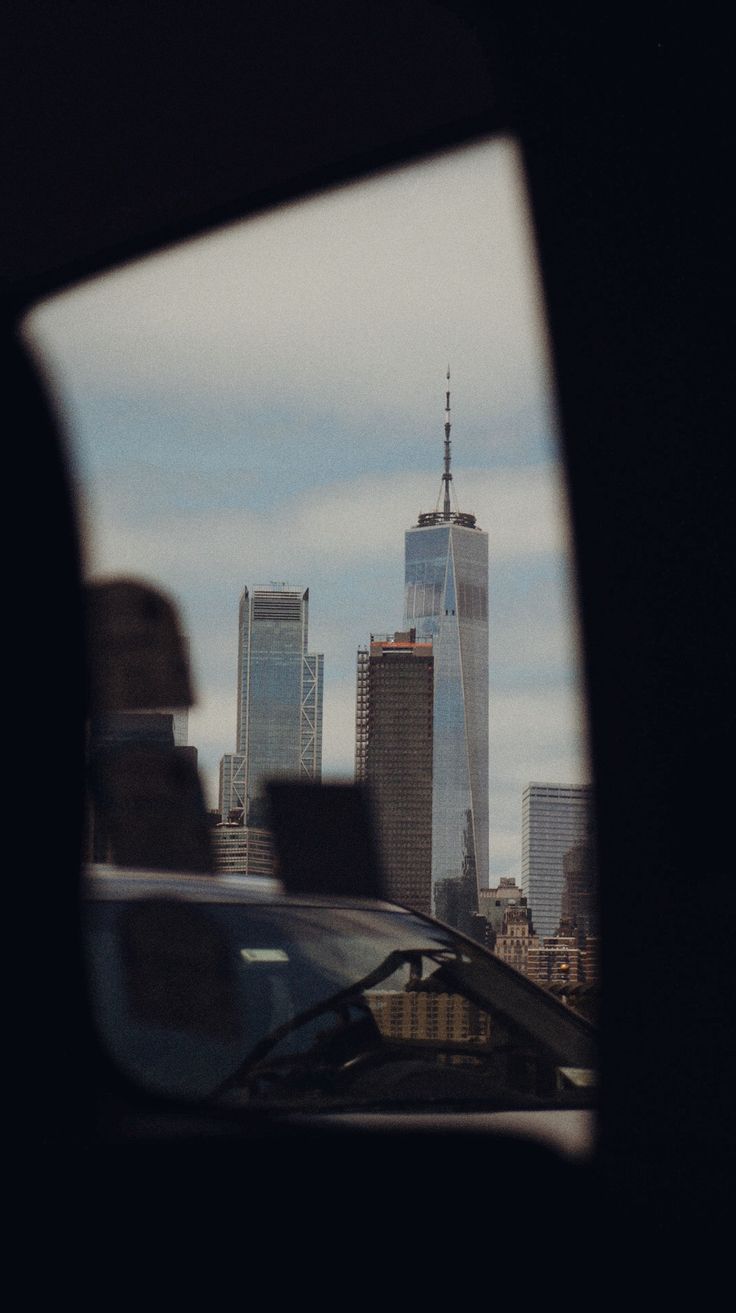 a view of the empire building from inside a car