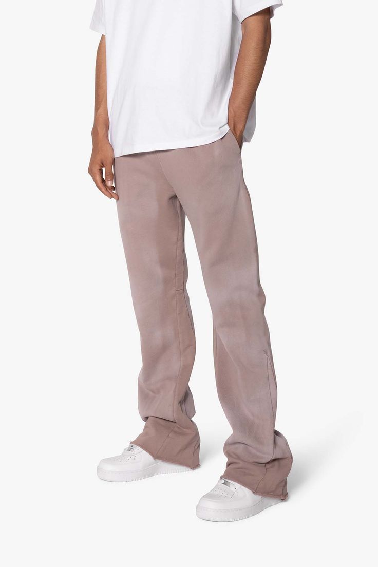 Our Faded Bootcut Sweatpants from custom developed cotton for unmatched quality and comfort. Featuring a garment-dyed and faded washed fleece for a luxurious feel and these sweatpants offer a relaxed, yet refined fit with a slight flair at the leg opening. The unique combination of a relaxed fit and tonal drawcord brings a modern twist to your every day wardrobe. details Style: Relaxed Fit Style: Internal Drawcord Composition: 100% cotton Model Info: 6’1, 140 lbs, wearing a size medium Faded Cotton Bottoms For Fall, Acid Wash Cotton Bottoms For Fall, Acid Wash Full-length Cotton Pants, Cotton Washed Pants For Loungewear, Washed Cotton Loungewear Pants, Washed Straight Leg Loungewear Pants, Faded Straight Hem Bottoms For Fall, Straight Leg Washed Pants For Loungewear, Acid Wash Wide Leg Cotton Pants