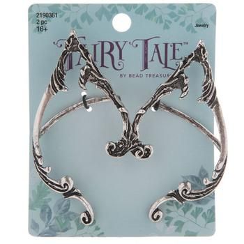 Accessorize in a way that complements your fun and fanciful style with these Ornate Elf Ear Earrings. These whimsical metal earrings have an antique silver finish, are shaped like pointed elf ears, and are adorned with a variety of ornate embellishments. In addition to the post that is inserted into your piercing, there is a metal band that slips over the top of your ear to help hold it in place. Showcase your unique style! Details: 	 Length: 2 13/16" 	 Width: 1 3/4" 	 Metal Color: Silver Card c Whimsical Silver Metal Earrings, Silver Elven Earrings As Gift, Elven Style Silver Earrings For Gift, Silver Elven Earrings For Gift, Cheap Cosplay, Fairy Grunge Aesthetic, Elf Ear, Silver Card, Fantasy Earrings