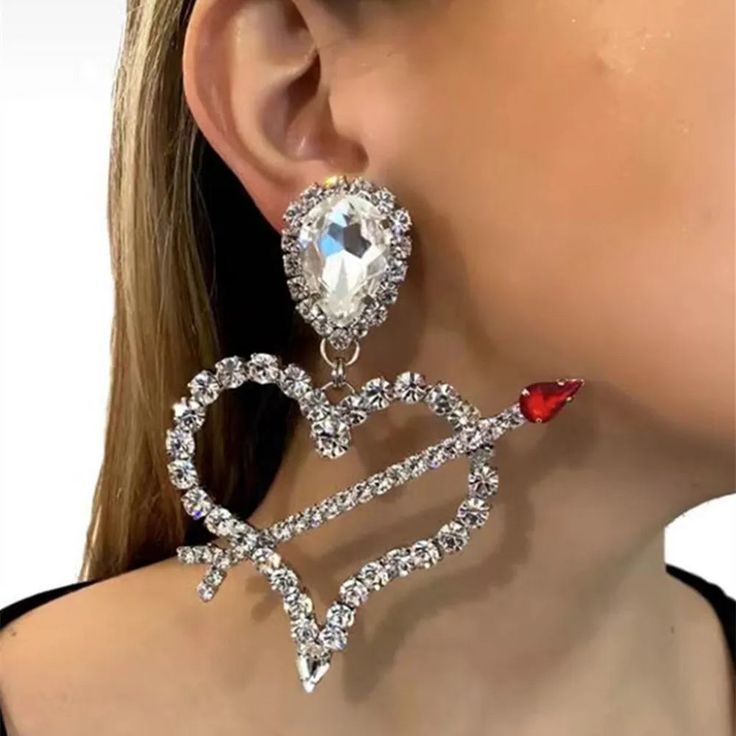 Rhinestone-Crystal Heart Drop Earrings Crystal Heart Earrings For Wedding, Elegant Crystal Heart Drop Earrings, Glamorous Heart Cut Crystal Jewelry, Bling Crystal Earrings For Anniversary, Crystal Rhinestone Earrings For Gifts, Heart-shaped Cubic Zirconia Crystal Earrings For Wedding, Valentine's Day Gold Crystal Earrings, Party Jewelry With Heart Cut Rhinestones, Crystal Dangle Heart Earrings For Wedding