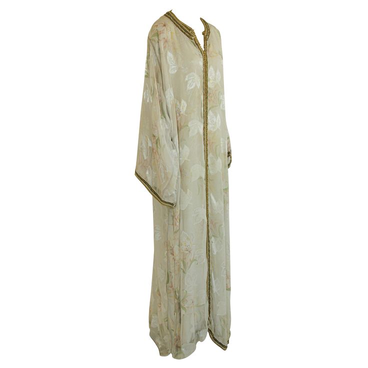 Moroccan caftan white floral silk embroidered. This is a set of two dresses that you can wear together or separate, circa 1980s. This long maxi dress set kaftan is embroidered and embellished entirely by hand. One of a kind evening Moroccan Middle Eastern hostess gown. The kaftan features a traditional neckline, with side slits and embellished long sleeves. In Morocco, fashion preserves its traditional style inherited from great civilizations that found their way to Northwest Africa, such as the Hostess Gown, Winning Awards, Morocco Fashion, The Moors, Moroccan Fashion, Moroccan Caftan, Dress Set, International Fashion, Long Maxi