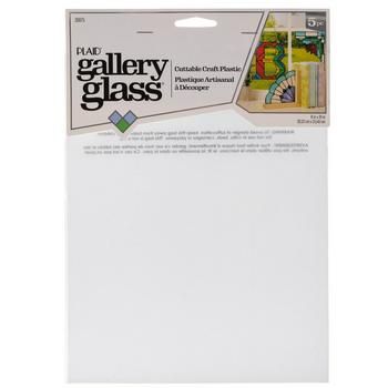 a white card board with an ad for gallery glass