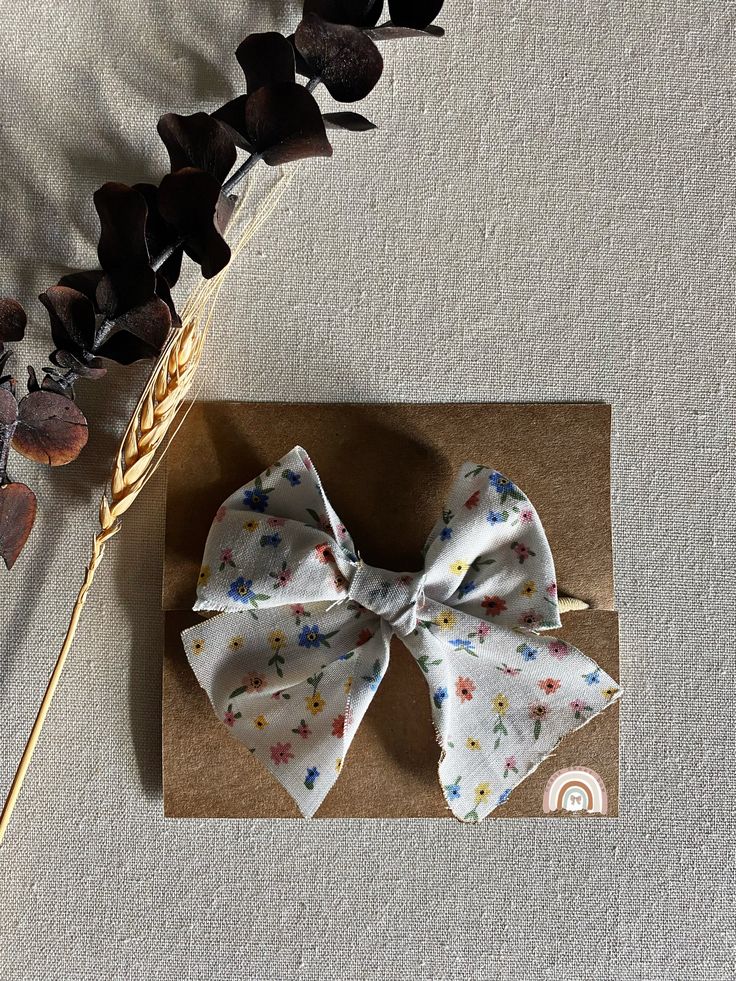 Handmade, cotton fabric bow. Cute Satin Bow For Spring, Cotton Bow For Spring, White Bow With Tie Back For Spring, Adjustable Cotton Bow - Cute Style, Cute Butterfly Knot Bow For Spring, Spring Cute Butterfly Knot Bow, Cute Adjustable Cotton Bow, Adjustable Cute Cotton Bow, White Summer Bow For Gifts