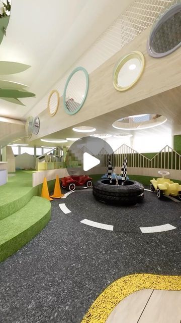 this is an image of a children's indoor play area with cars and ramps