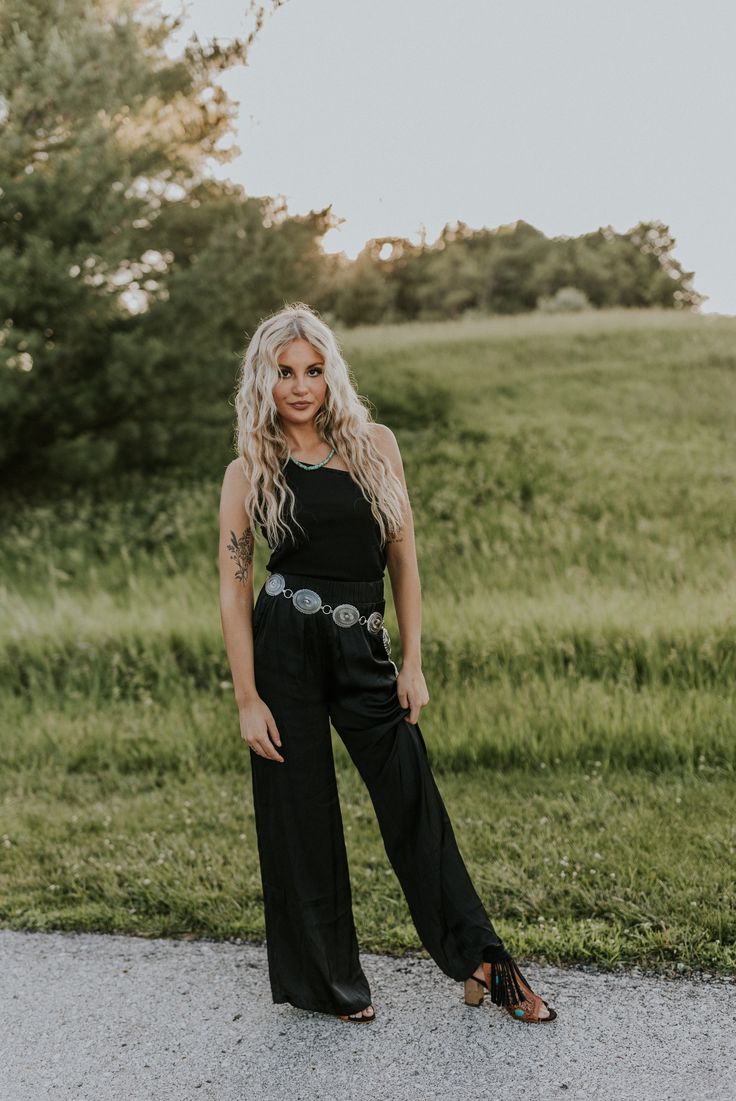 Black slick pants. Edgy Wide Leg Pants For Night Out, Edgy Spring Straight Pants, Edgy Straight Pants For Spring, Edgy Wide Leg Pants, Edgy Black Wide-leg Pants, Edgy Straight Pants For Night Out, Pants, Black, Trousers