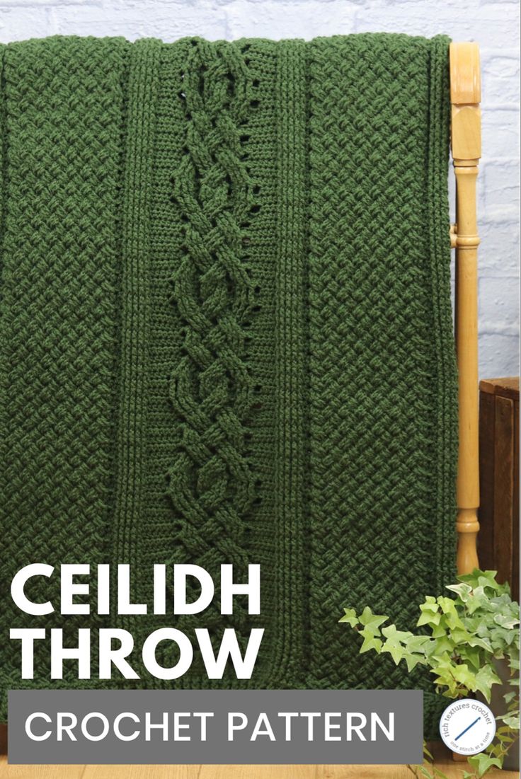 A green coloured crochet blanket hanging on a quilt rack Crochet Reading Blanket, Irish Crochet Blanket Patterns Free, Difficult Crochet Patterns, Irish Crochet Blanket, Cable Blanket Crochet Pattern, Crochet Panels, Cable Crochet Blanket, Green Crochet Blanket Patterns, Cable Crochet Blanket Pattern Free