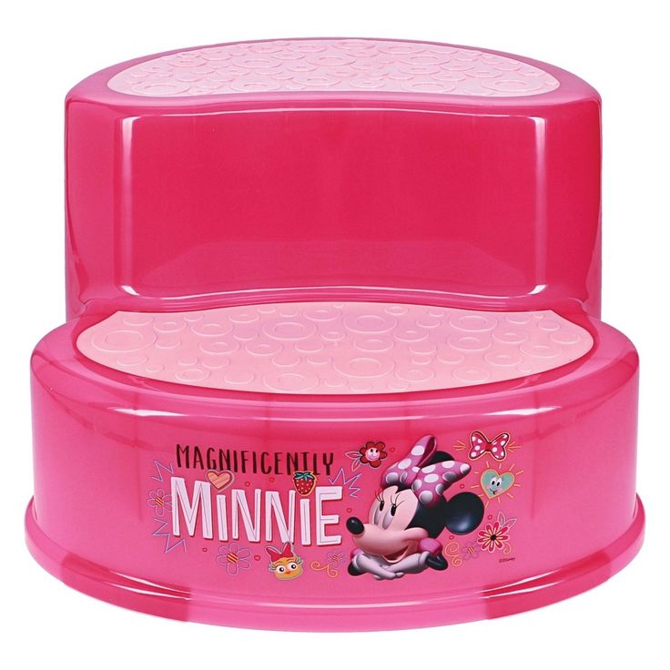 the minnie mouse step stool is pink and has mickey mouse on it's lid