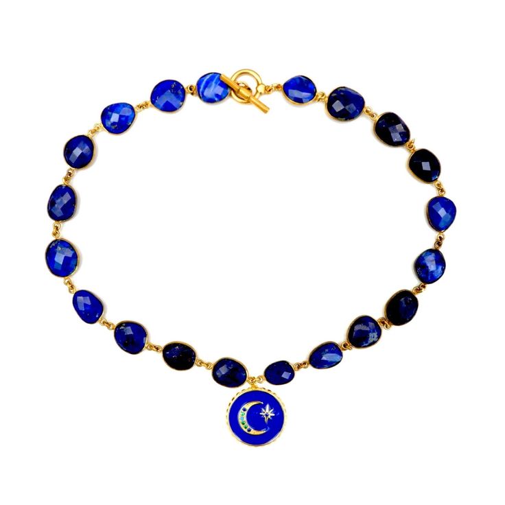 Handcrafted vintage Lapis Lazuli necklace, a gorgeous blue enamel round pendant with a moon and star in gold vermeil, vintage toggle clasp. Wear it alone or layered with other necklaces from our collection as shown in images. Lapis lazuli is one of the oldest opaque gemstones in history--more than 6,500 years! This deep blue stone includes tiny flecks of mica, like a night sky full of stars. With a name that dances on the tongue, rich history with royalty and artists, and a shimmering deep blue Handmade Celestial Jewelry With Round Beads, Handmade Oval Lapis Lazuli Necklace, Handmade Celestial Beads Jewelry, Elegant Blue Moon Phase Necklace, Blue Moon Phase Round Pendant Jewelry, Blue Celestial Round Pendant Jewelry, Celestial Blue Round Pendant Jewelry, Single Strand Lapis Lazuli Necklace, Celestial Blue Necklaces