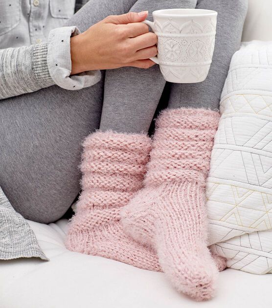 How To Make Hygge Slouchy Socks Online | JOANN Crochet Patterns Slippers, Hygge Yarn, Trendy Crochet Patterns, Slouchy Socks, Free Knit Pattern, Knitting Amigurumi, Crochet Socks Pattern, Knitted Slippers Pattern, Hoodie Diy