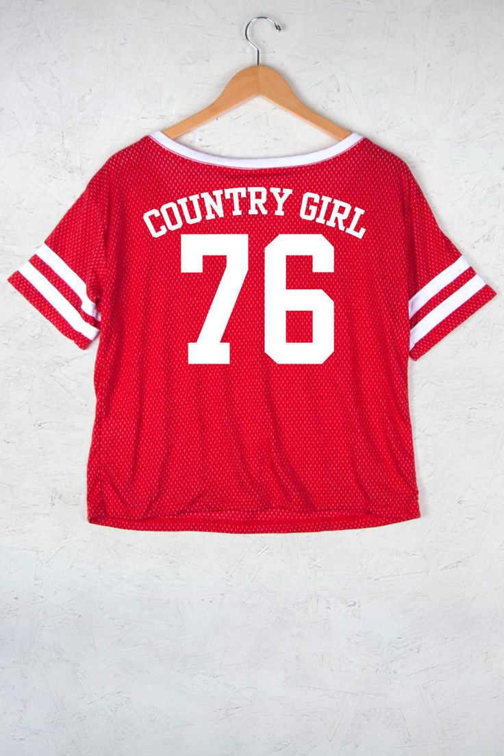 Country Girl Store - Women's Country Girl® Meshy Burnout Cropped V-Neck Tee, $33.95 (http://www.countrygirlstore.com/womens/short-sleeve-tees/country-girl-meshy-burnout-cropped-v-neck-tee/) Graphic Tee T-shirt With Team Name For Summer, Graphic Tee T-shirt For Cheerleading, Crew Neck T-shirt With Sublimation Print For Cheerleading, Trendy Red T-shirt For College, Summer Graphic Tee With Team Name, Trendy Graphic Print Tops For Sports Season, Trendy Sports Season Graphic Print Tops, Short Sleeve T-shirt For Summer Cheerleading, Red Tops With Text Print For Sports Events