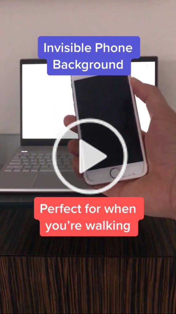 someone is holding their cell phone in front of a laptop screen with the text invisible phone background