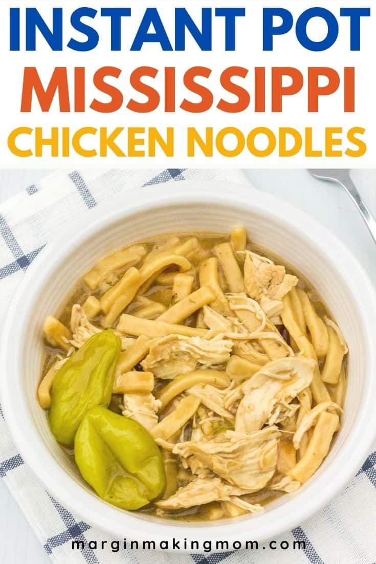 instant pot mississippi chicken noodle soup in a white bowl with green peppers on the side