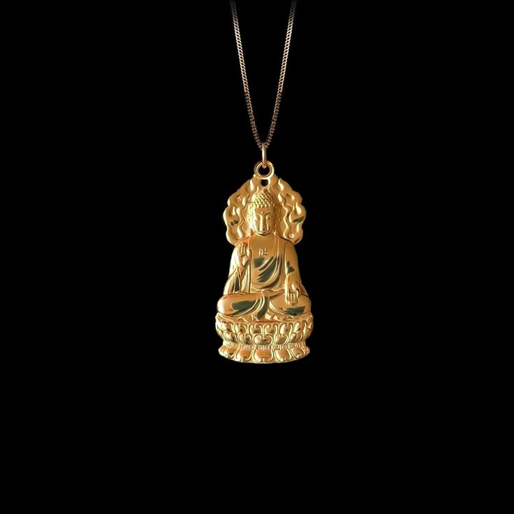 Find peace and enlightenment with our gold Buddha pendant, exquisitely crafted in the USA. Symbolizing serenity, wisdom, and spiritual awakening, each piece is a sanctuary of calm and reflection. PENDANT INFORMATIONThis pendant is made of real, solid gold.• Made in USA• Material: 14k or 18k solid gold• Finish: polished• Height: 1.25" (31,5 mm) x Width: 0.6" (15 mm)• Pendant weight: approx. 6 grams (14k)• Bail: fits up to 4 mm chains• Solid back, not hollow• A certificate of authenticity is inclu Buddha Pendant Necklace, Byzantine Jewelry, Gold Buddha, Buddha Pendant, Solid Gold Chains, Mini Pendants, Box Making, Find Peace, Yellow Gold Pendants