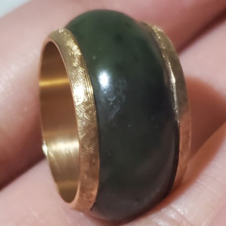 14k Marked And Tested Yellow Gold Standard Eternity Style Jade. In Immaculate And Study Condition. Weight 6.9grams And Size 6.5. The Width Is .45" And Cannot Be Resized. Elegant Green Domed Jewelry, Formal Domed Hallmarked Jewelry, Elegant Green Domed Rings, Elegant Engraved Green Rings, Elegant Green Engraved Rings, Elegant Domed Yellow Gold Jewelry, Elegant Yellow Gold Domed Jewelry, Formal Yellow Gold Rondelle Jewelry, Jade Color