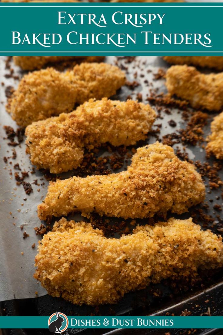 fried chicken tenders on a baking sheet with text that reads, extra crispy baked chicken tenders