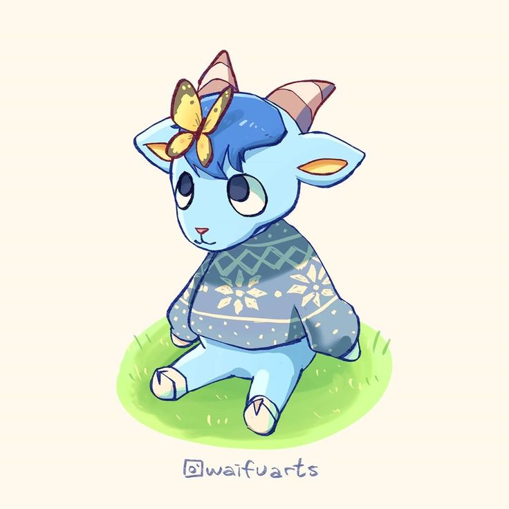 an animal with a butterfly on it's head sitting in the grass and wearing a sweater