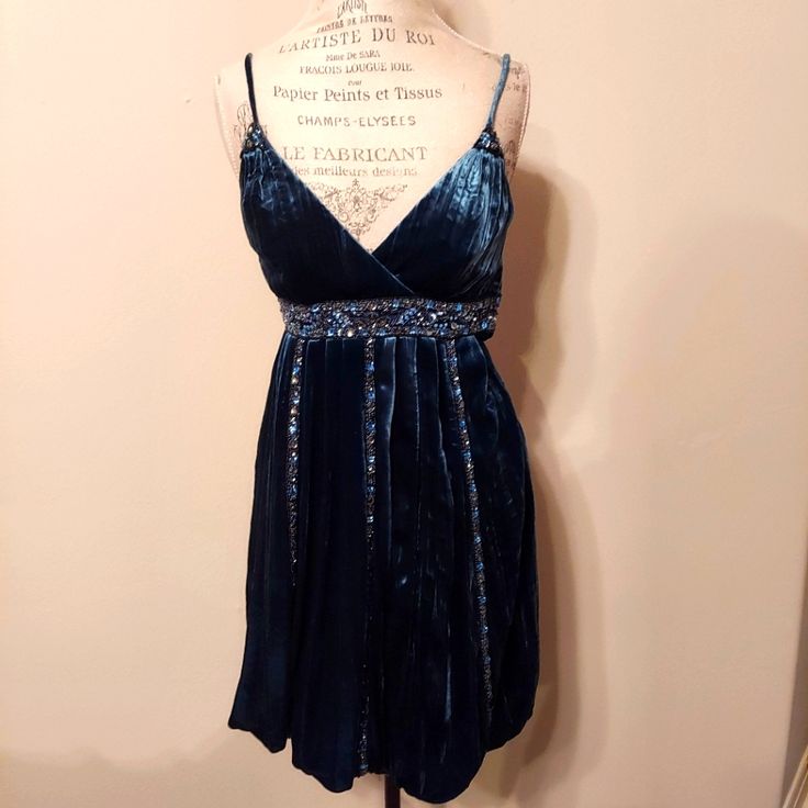 This New With Tags Dress Is In Excellent Condition. The Dress Is A Peacock Blue Silk Velvet With Beading And Sequins At The Empire Waist, Vertically Down The Skirt And At The Front Of The Spaghetti Straps.The Dress Has A Bubble Hem, Is Fully Lined And Has A Side Zipper. The Dress Is A Size 6 But The Brand Runs Small So If You Wear A Size 4, This Dress Will Probably Fit You So Please Check Measurements. Size 6 Bust 34.5 Waist 26 Hip 36 Length 34 Sugar Skull Dress, Womens T Shirt Dress, Lace Tube Top, Cami Slip Dress, Velvet Party Dress, Skull Dress, Sue Wong, Embroidered Tunic Dress, Crochet Maxi Dress