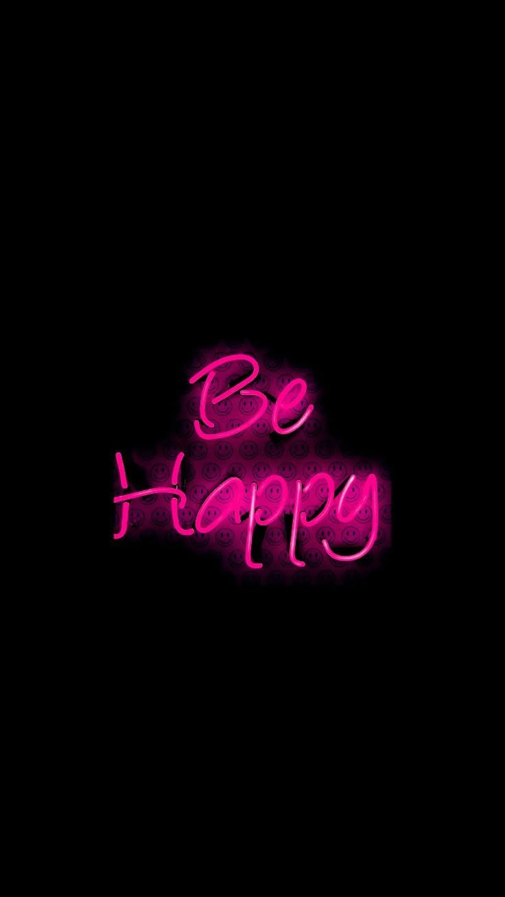 the words be happy are lit up in pink