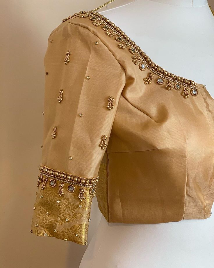 To get your  outfit customized visit us at Srinithi In Style Boutique Madinaguda Hyderabad WhatsApp/Call : +919059019000 /  or mail us at srinithiboutiquee@gmail.com  for appointments, online order and further details... Worldwide Shipping Avalible Golden Blouse Designs Pattern Gold, Gold Blouse Designs Indian, Golden Blouse Aari Work, Golden Embroidery Blouse, Gold Blouse Designs Latest, Golden Blouse Designs, Gold Blouse Designs, Golden Blouse, Mirror Work Blouse Design