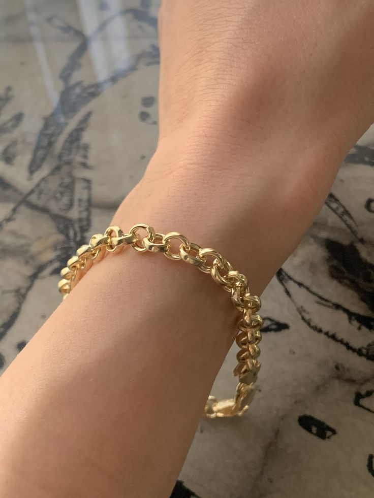 5.5 grams Bracelet lengt: 9 inches Bracelet width: 0.40 14K Gold Thick Chain Bracelet Let's Stay Connected FOLLOW ME ON INSTAGRAM FOR SPECIAL DEALS AND GIVEAWAYS Instagram Link : https://www.instagram.com/noiconejewellry/ ABOUT US I founded Noicone Jewellery, Istanbul based jewellery brand, in 2020. Why? Because, I wanted to make something unique, innovative, creative, permanent, and fascinating.  I tried to gather my ambitions, ideas, skills at the same place. I wanted to share my style, creativity, and vision with a big audience and I tried to make all of these in my brand. I have tried to bring together every product I sell in this brand with my hands and mind in a common way and present them all in a way that is unique and unique in the world. My only goal here is to make the people wh Everyday Oval Gold Chain Bracelet, Minimalist Oval Chain Bracelet With Solid Links, Minimalist Tarnish Resistant Oval Bracelets, Everyday Oval Metal Chain Bracelet, Minimalist Oval Bracelets For Everyday Wear, Everyday Oval Chain Bracelet With Adjustable Chain, Everyday Oval Chain Bracelet, Everyday Oval Adjustable Chain Bracelet, Minimalist Oval Jubilee Bracelet