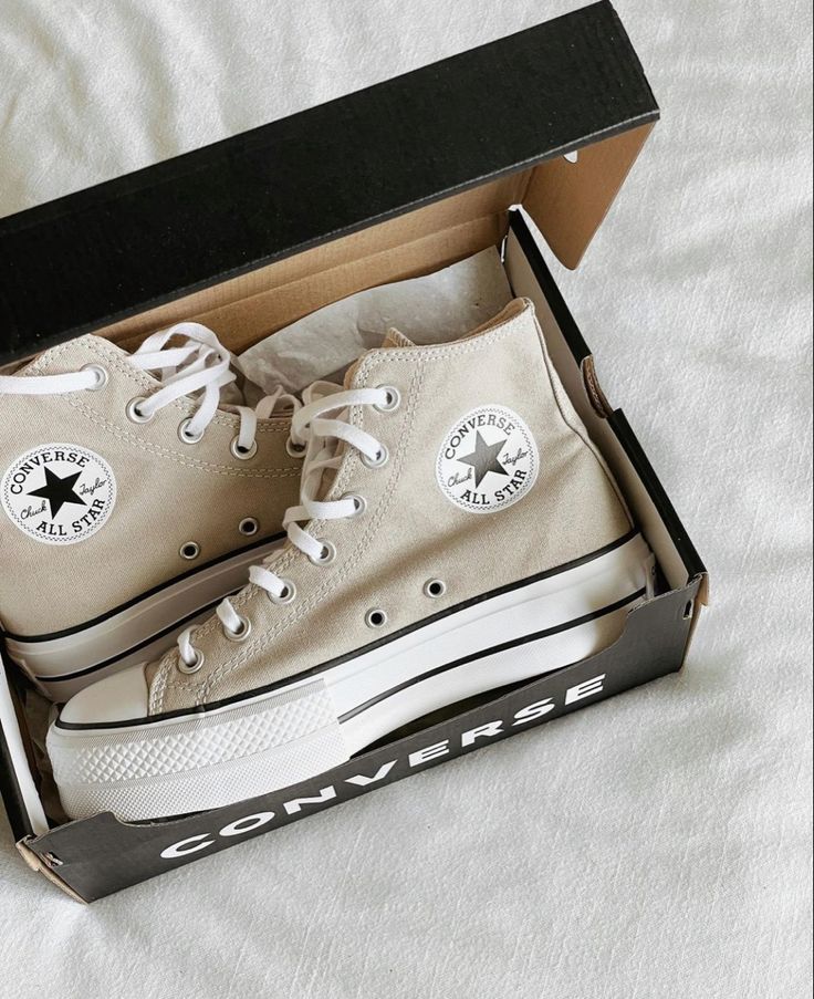 A shoe box has tan converses sitting inside. Oat Milk Converse, Sneaker Unboxing, Converse Beige, Tan Converse, Beige Converse, Converse Cream, Cream Converse, White Shoes For Girls, Converse Aesthetic