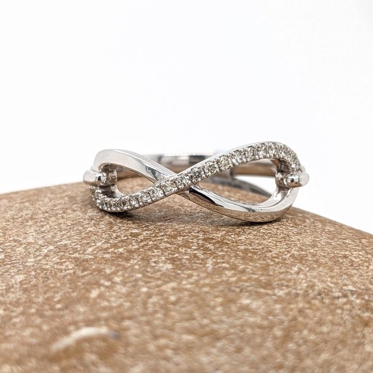 This infinity sign band is perfect for wearing by itself or stacking with other rings or bands! The occasions to show off this band are endless - Valentines day, mother's day, graduation, wedding, birthday, date night, Christmas, etc. :) Valentine's Day Anniversary Stackable Open Heart Rings, Valentine's Day Infinity Heart Ring, Valentine's Day Infinity Jewelry With Custom Name, Sterling Silver Infinity Rings For Valentine's Day, Valentine's Day Infinity Necklace Engraved, Infinity Sign, Ring Sizer, Gold Design, Anniversary Rings