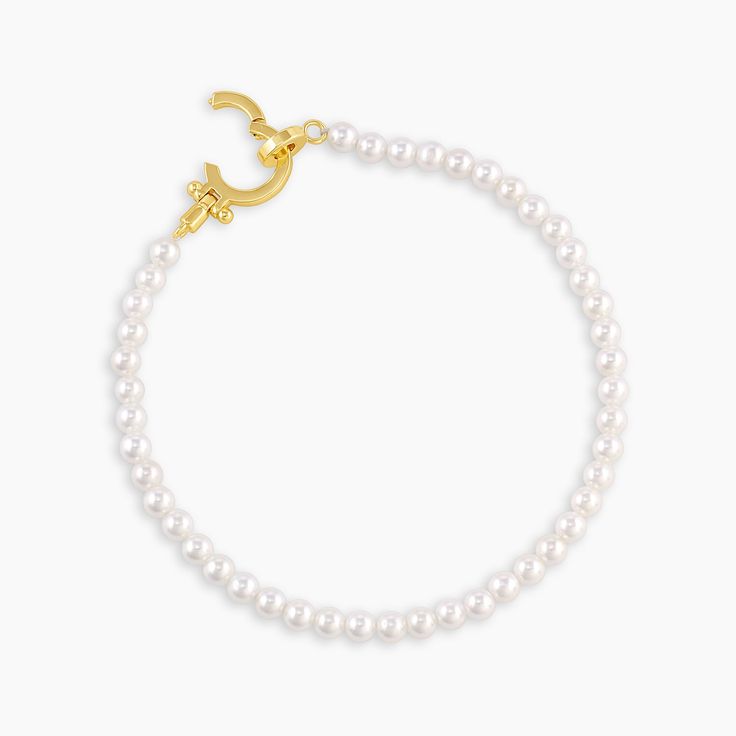 Pearls, but make them modern. Add a charm that means something to you — what could be more romantic? Product Details Total length 7" Pearl shells measure 3/16" Natural color and size may vary Hinge closure measures 3/8" Available in 18k gold plated brass Avoid contact with anything containing derivatives of alcohol | Parker Pearl Bracelet, Women's by gorjana Elegant Pearl Bracelet With Lobster Clasp, Elegant White Pearl Bracelet With Lobster Clasp, Elegant Pearl Bracelet With Lobster Clasp For Wedding, Black Labradorite, Orange Agate, Natural Weave, Iridescent Crystal, Snowflake Obsidian, Pink Enamel