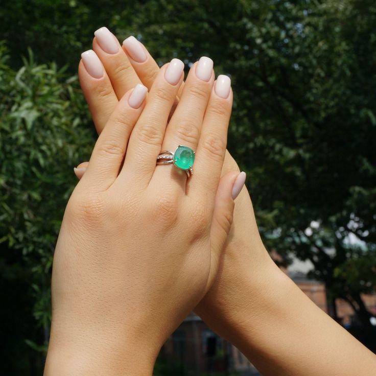 A Breathtakingly Striking  HANDMADE 14k White Gold Ring with Beautiful Cushion Cut Emerald in RICH Green color! The GEM is 5.28 CT and measure 12.36x11.19x5.63 mm! This Stone will take your breath away, especially on the sunlight! You will want to look at this stone endlessly.The mounting is a masterpiece! HANDMADE 14K White Gold Mounting (tested), that was is custom made to Accommodate this Beauty of a Gem in V-Prongs setting! Super FINE Workmanship on the Diamond prong  setting with 14 pcs Brilliant Full Cut Diamonds in G color, VS clarity, totaling to approx 0.47 ct! Fabulous Braided Band and Diamond Gallery! The Entire Top's outline is 13.0x11.0 mm - HUGE. The Ring weights 6.7 g, nice and SOLID. Sits 9.0 mm off the top ofthe finger. Finger size 7 Center Stone: Emerald (100% Natural) Ce Gia Certified Platinum Gemstones Fine Jewelry, Luxury White Gold Gia Certified Gemstones, Luxury Gia Certified White Gold Gemstones, Fine Jewelry Platinum Gemstones For Formal Occasions, Formal Platinum Gemstones Fine Jewelry, Formal Round Cut Platinum Gemstones, Luxury Gia Certified Emerald Gemstones, Luxury Gia Certified Gemstones, Classic Cushion Cut Brilliant Gemstones