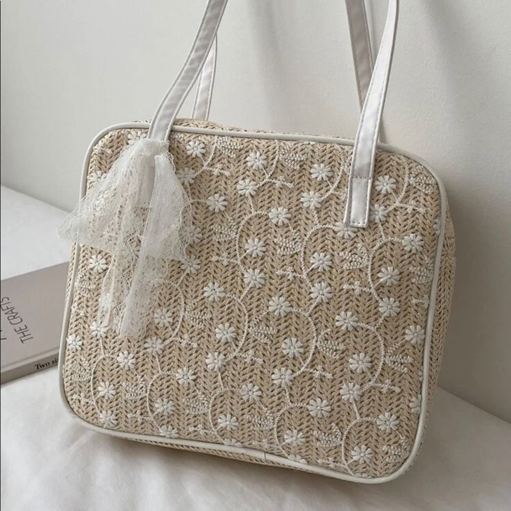 This Is A New Straw Bag With A White Floral Lace Overlay. Perfect For The Beach And Summer Weather! Cream Square Bag For Vacation, Cream Square Vacation Bag, White Square Crochet Bag For Beach, White Square Crochet Bag For Vacation, White Square Shoulder Bag For Beach, Elegant White Straw Tote Bag, White Square Crochet Beach Bag, Rectangular White Crochet Bag For Vacation, Large Capacity White Crochet Bag For Shopping