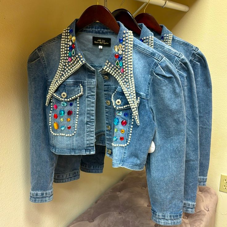 Denim Jacket With Colorful Rhinestones Excellent Boutique Quality 10% Cotton 28% Polyester 2% Elastane This Is A Wonderful Stretchy Material In Case You Are Between Sizes Embellished Medium Wash Denim Jacket, Blue Denim Embellished Outerwear, Spring Denim Jacket With Rhinestones, Embellished Blue Denim Outerwear, Fall Denim Jacket With Rhinestones, Blue Embellished Denim Outerwear, Spring Rhinestone Denim Jacket, Long Sleeve Denim Outerwear With Rhinestones, Denim Outerwear With Rhinestones And Long Sleeves