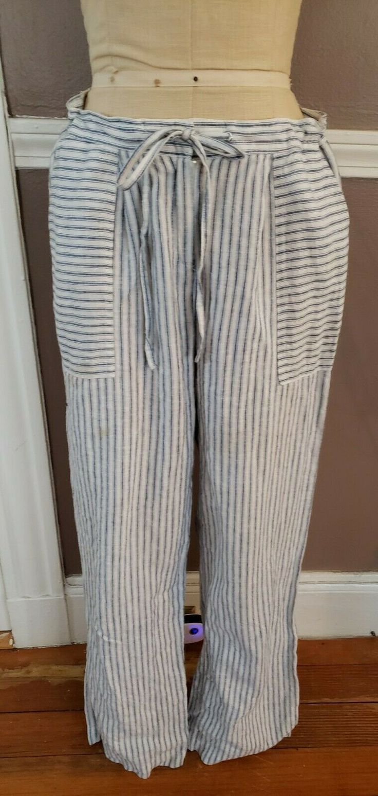 Amazing Multicolor Linen Blend Striped Pants W/Pockets By Laundry!! Size 4!! Please look at all pictures thoroughly and feel free to contact me with and questions you may have. Happy bidding!!! Please note that this is a pre-owned garment and or item and not in "brand new" condition. All of our items are not new unless stated and it is reasonable to have some signs of wear. If an item has unusual characteristics, we will state this within the description. If you have any questions, please ask be Summer Linen Striped Bottoms, Baggy Striped Pants With Pockets, Striped Linen Beach Pants, Striped Cotton Wide-leg Pants, Striped Wide-leg Linen Pants, Loose Pants, Striped Pants, Linen Blend, Brand New