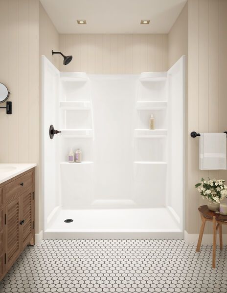 a bathroom with a white shower and tiled floor