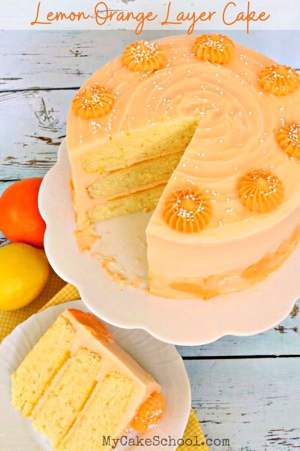 a lemon orange layer cake on a white plate with a slice cut out and served