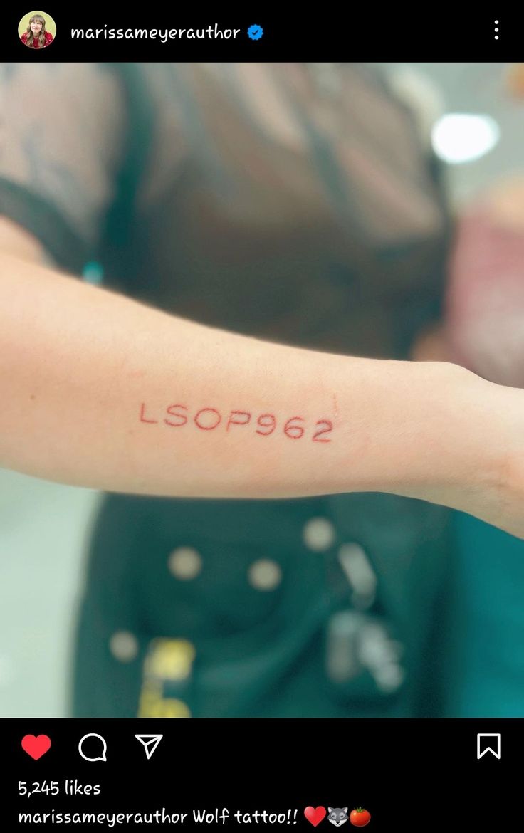 a person with a tattoo on their arm that reads l sop92 2