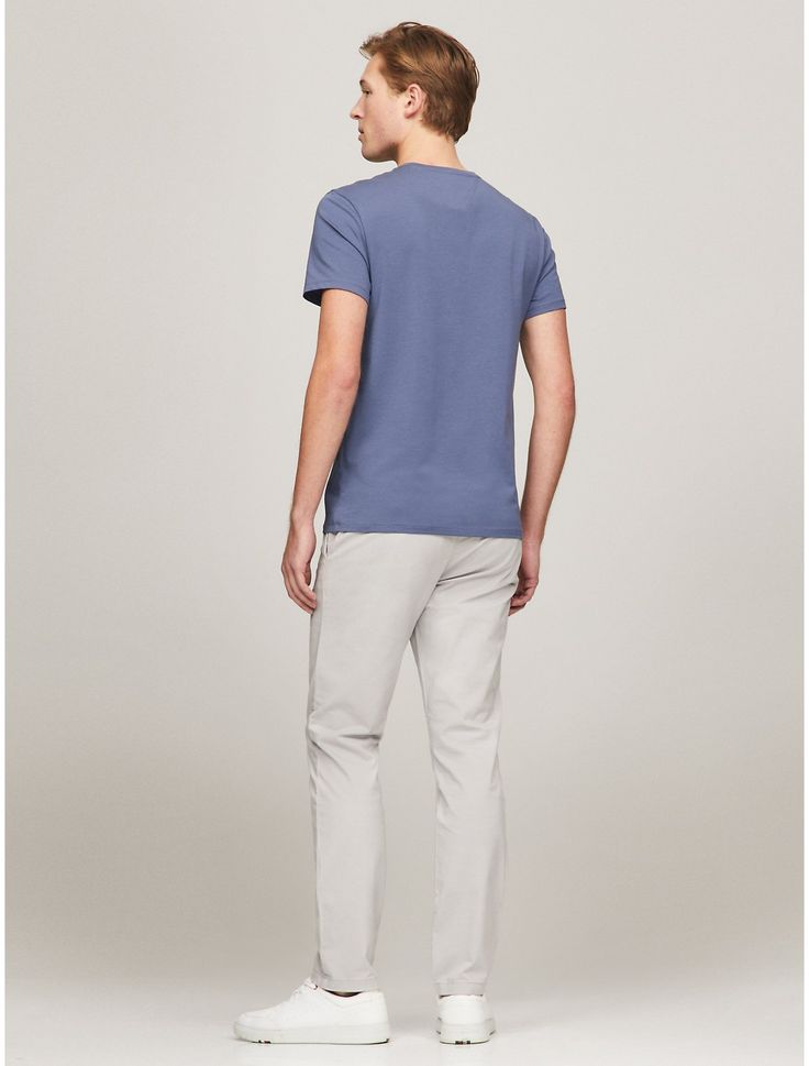 Tommy Hilfiger men's T-shirt. Made from stretch cotton, our slim-cut tee fits just right. It's the perfect layer or works well on its own with jeans or chinos. It might be a wardrobe basic, but it's much more than that.  Material: 95% Regenerative Cotton, 5% Elastane. Tommy Hilfiger Classic Cotton T-shirt, Tommy Hilfiger Relaxed Fit Cotton T-shirt, Casual Tommy Hilfiger Cotton T-shirt, Tommy Hilfiger Casual Cotton T-shirt, Casual Everyday Tommy Hilfiger Tops, Tommy Hilfiger Store, Cut Tees, Mens Casual, Mens Casual Outfits