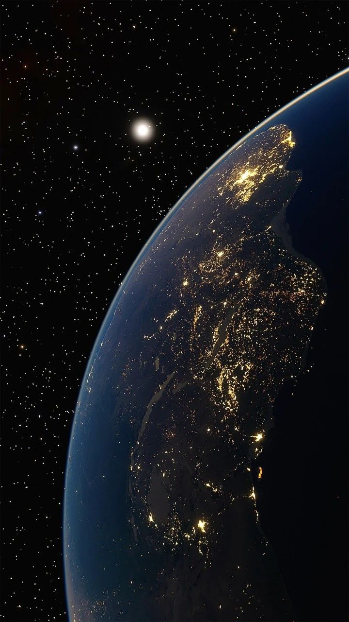 the earth is lit up at night from space