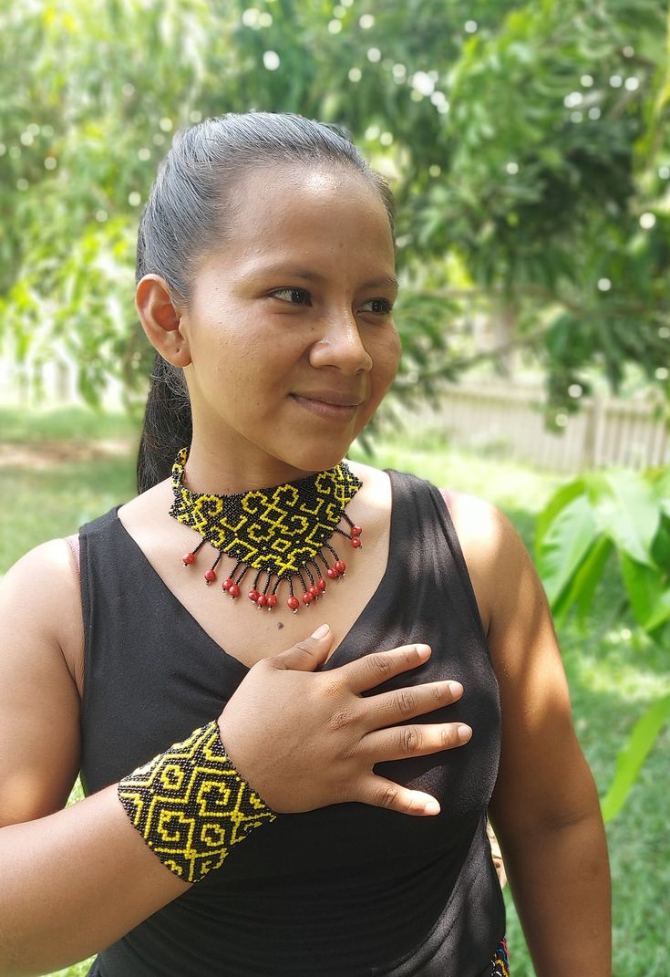 A beautiful tribal set of bracelet and necklace in shipibo icaros patterns worn by a Shipiba in her village. im selling the set as a complete here but you can also choose the necklace or bracelet seperately in other listings. Fair Trade Bracelet Jewelry For Festivals, Traditional Black Handwoven Jewelry, Traditional Handwoven Black Jewelry, Fair Trade Festival Bracelet Jewelry, Black Beads Festival Bracelet, Black Bead Bracelet For Festivals, Festival Black Bead Bracelet, Festival Black Beads Bracelet Jewelry, Traditional Black Handwoven Necklace