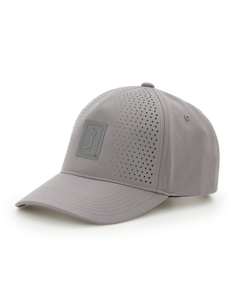 Sun protection and style come together in this golf cap from PGA TOUR Apparel. Designed to keep the sun out of your eyes both on and off the course, the classic baseball hat features a rectangular logo patch and perforations on the front for an athletic modern look. The golf sun hat is crafted from durable ripstop fabric that stands up well to regular wear and tear, and the material is enhanced with stretch for a comfortable fit. 89% Polyester / 11% Elastane Ripstop fabrication uses a special reinforcing technique to create a garment that resists ripping and tearing Durable Ripstop Fabric Classic Ball Cap Design Rectangular Logo Patch On Front Panel Perforations For Airflow And Style Enhanced With Stretch For A Comfortable Fit Hand Wash Imported | PGA TOUR Apparel Men's Perforated Golf Cap Adjustable Breathable Golf Hat, Adjustable Six-panel Baseball Cap For Golf, Breathable Golf Baseball Cap, Breathable Functional Baseball Cap For Golf, Functional Curved Brim Baseball Cap For Golf, Breathable Visor Hat For Golf, Breathable Curved Brim Golf Hat, Breathable Baseball Cap For Golf, Breathable Snapback Baseball Cap For Golf